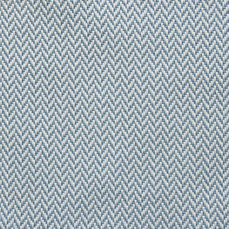 Närbild på tyget till sittsäck fåtölj Lounge 100 Canaria Light Blue, med fiskbensmönster i ljusblått och vitt.