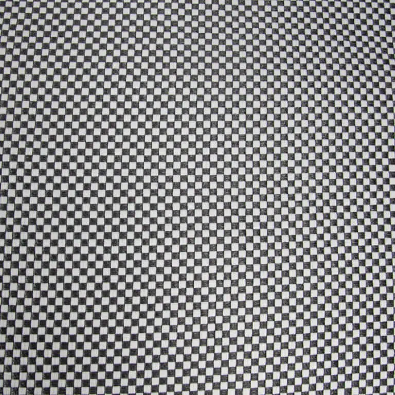 Närbild på tyget till sittsäcksfåtöljen Lounge 100 Capri Grey, med svart och vit rutigt mönster.