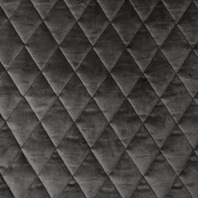 Närbild på Lure Luxe Grey sittsäck fåtölj med diamantquiltat tyg.