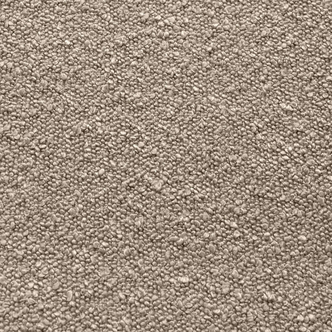 Närbild på textur av Madu Cream sittsäck fåtölj i bouclétyg.