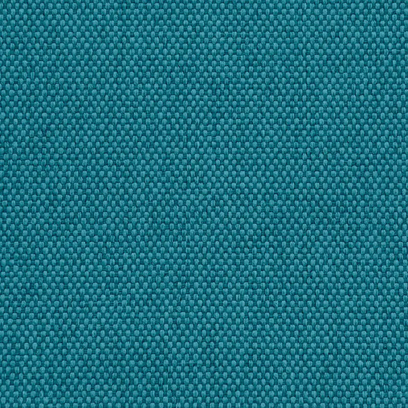 Närbild av tyget till Lounge 100 fåtölj i nordisk turkos med en grov, vävd textur.