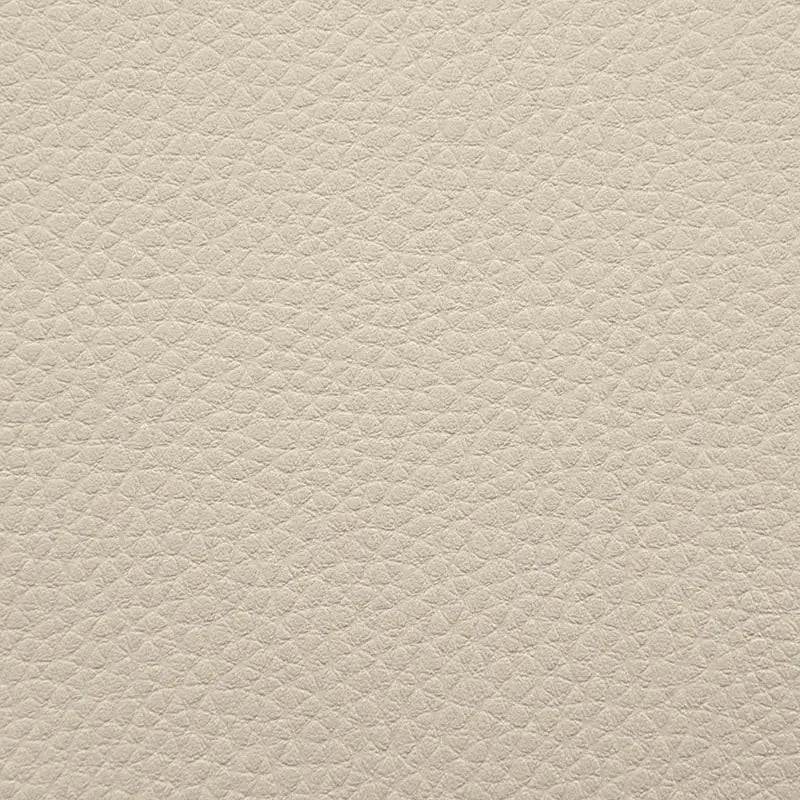 Närbild på beige sittsäck fåtölj med texturerat tyg för utomhusbruk.