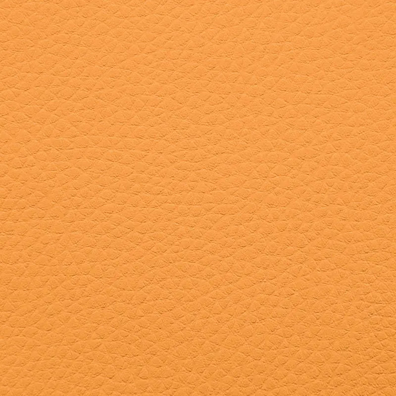Närbild av texturerat gult tyg för Sittsäck Lounge 100 Outside, en bekväm fåtölj.