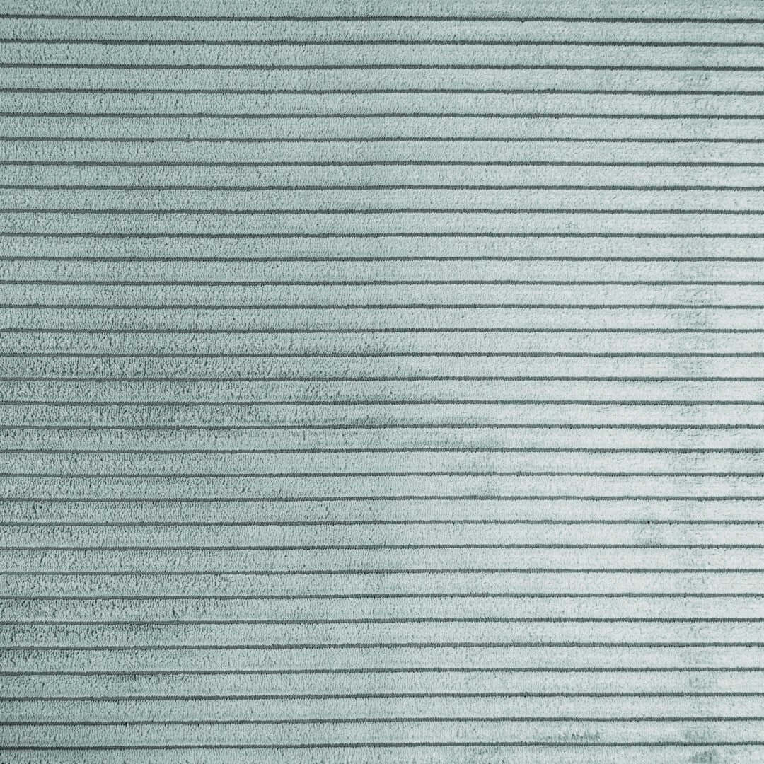 Närbild på mintgrön ribbad tygtextur för Lounge 100 sittsäcksfåtölj.